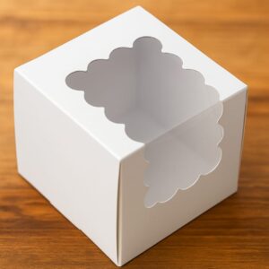 single cupcake white window